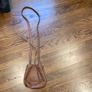 Small brown satchel bag with tassels